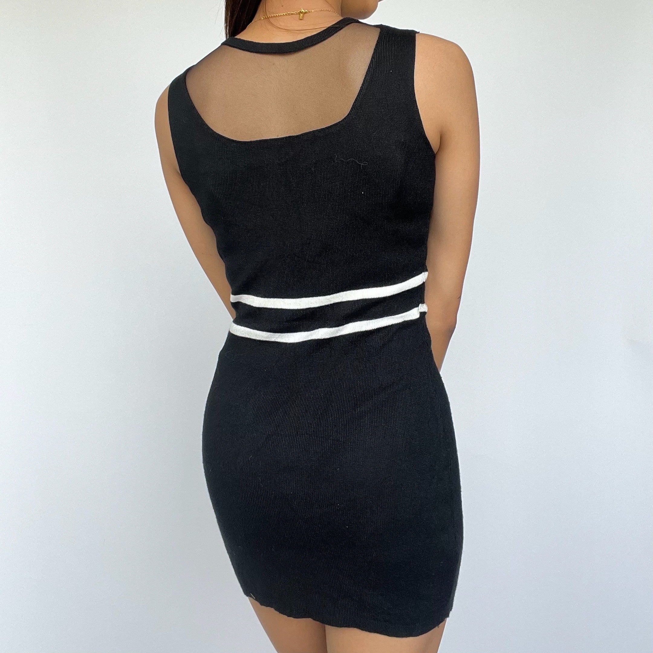 Black mesh-neck bodycon dress